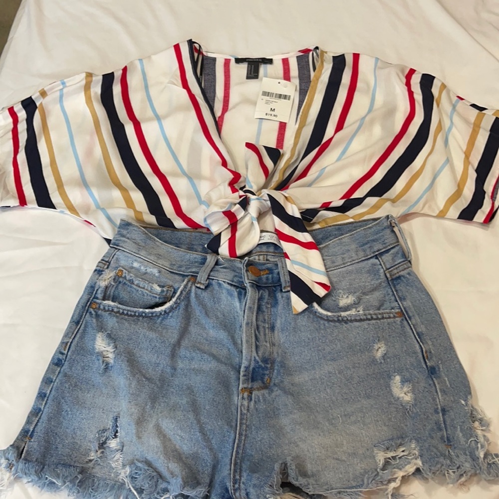 Stripes tie front blouse .